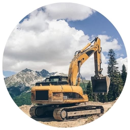 Excavator working on a mountain road in Washington state